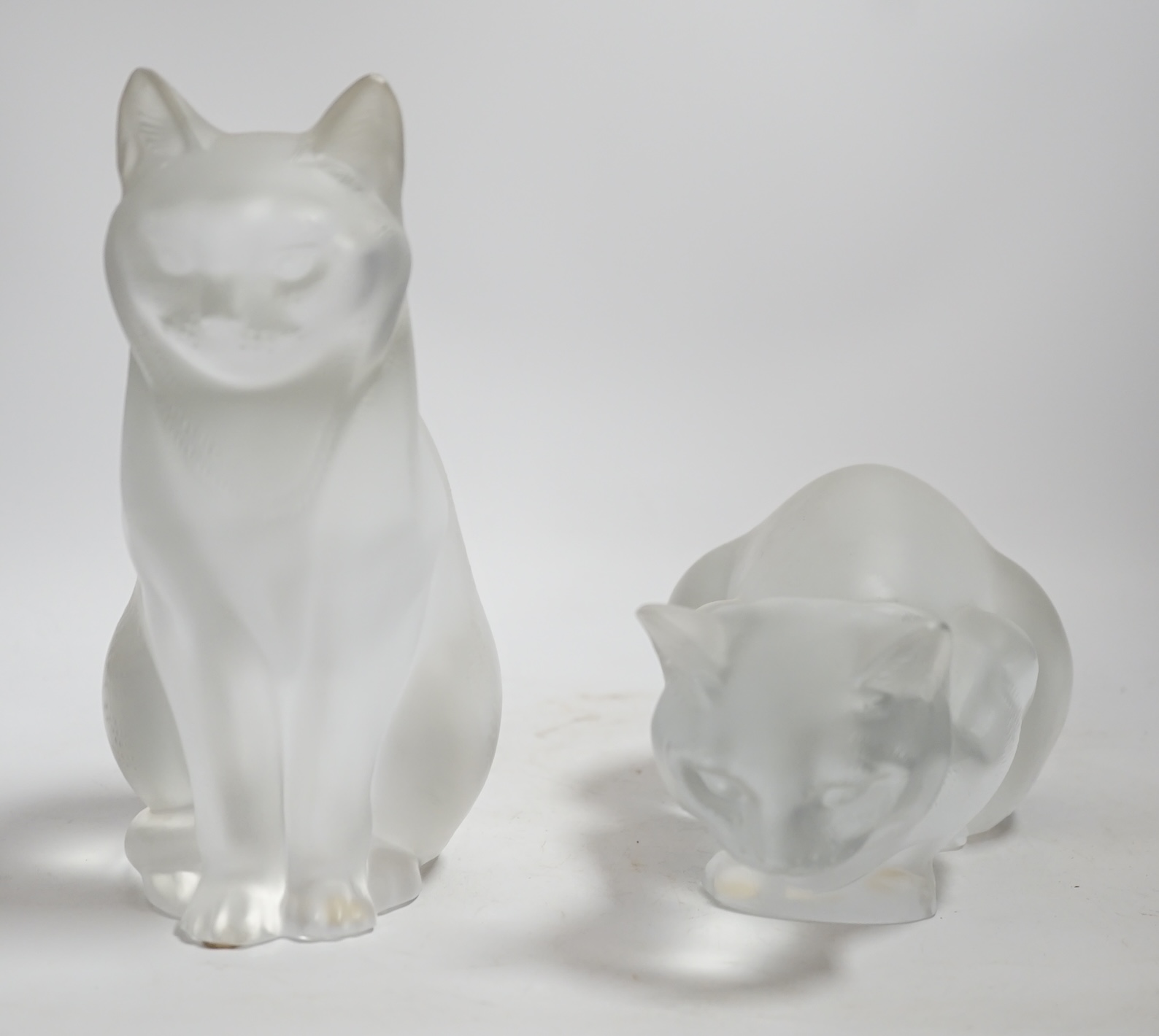 Two lalique glass frosted cats, tallest 21cm